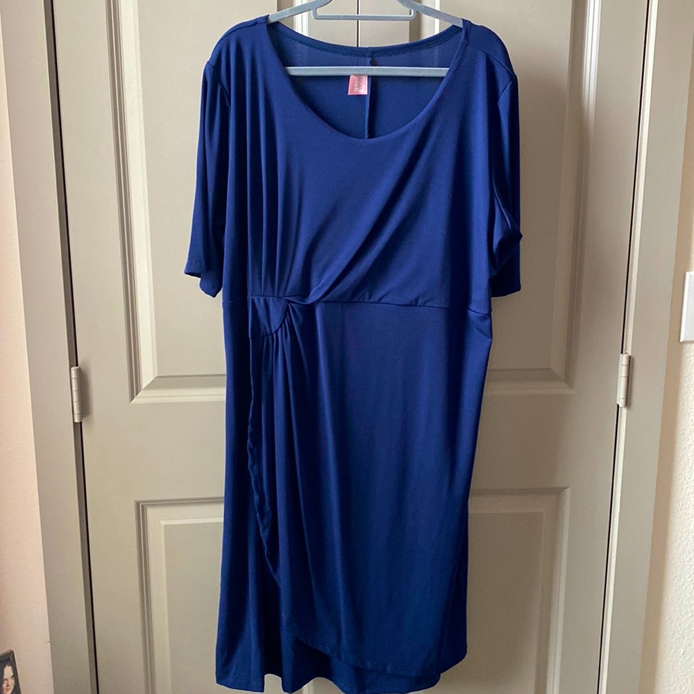Midi length, short sleeve navy dress.  Cute gather detail around upper waist.